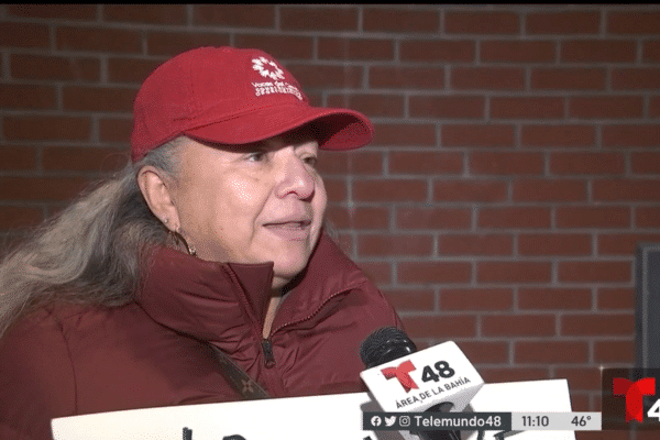 Marina Palma stands at City Hall discussing housing issues that are happening in the Canal