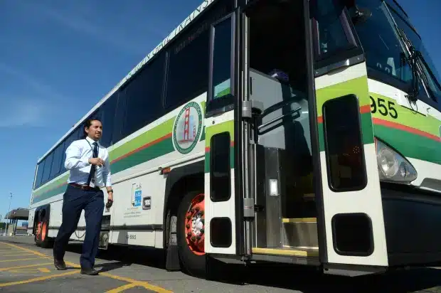 Golden Gate Transit bus driver Nathan Calderon gets on a bus in San Rafael on Thursday, April 27, 2023. Calderon is a recent graduate of a Canal Alliance workforce program. (Alan Dep/Marin Independent Journal)