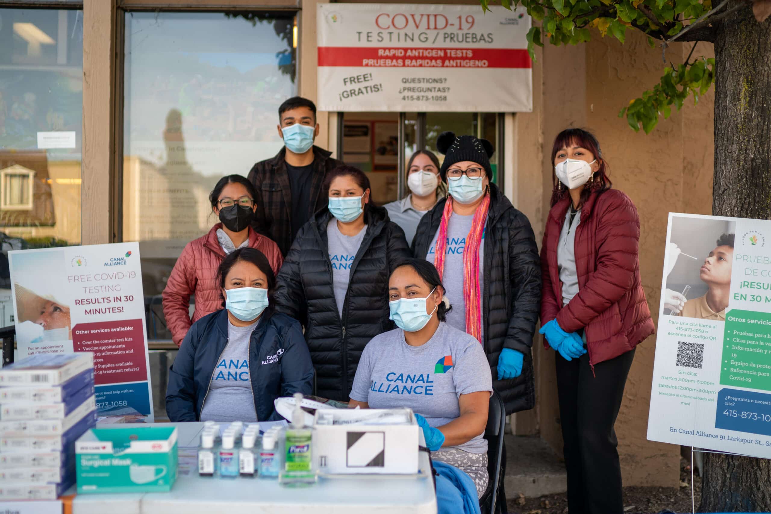 Health Team poses for a portrait in front of the Canal Alliance Health House.